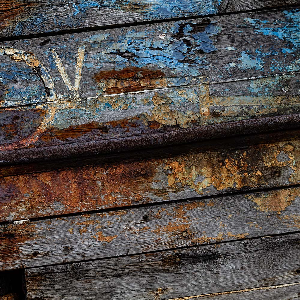 Camaret-sur_mer | The side of a rotting hulk of a fishing boat