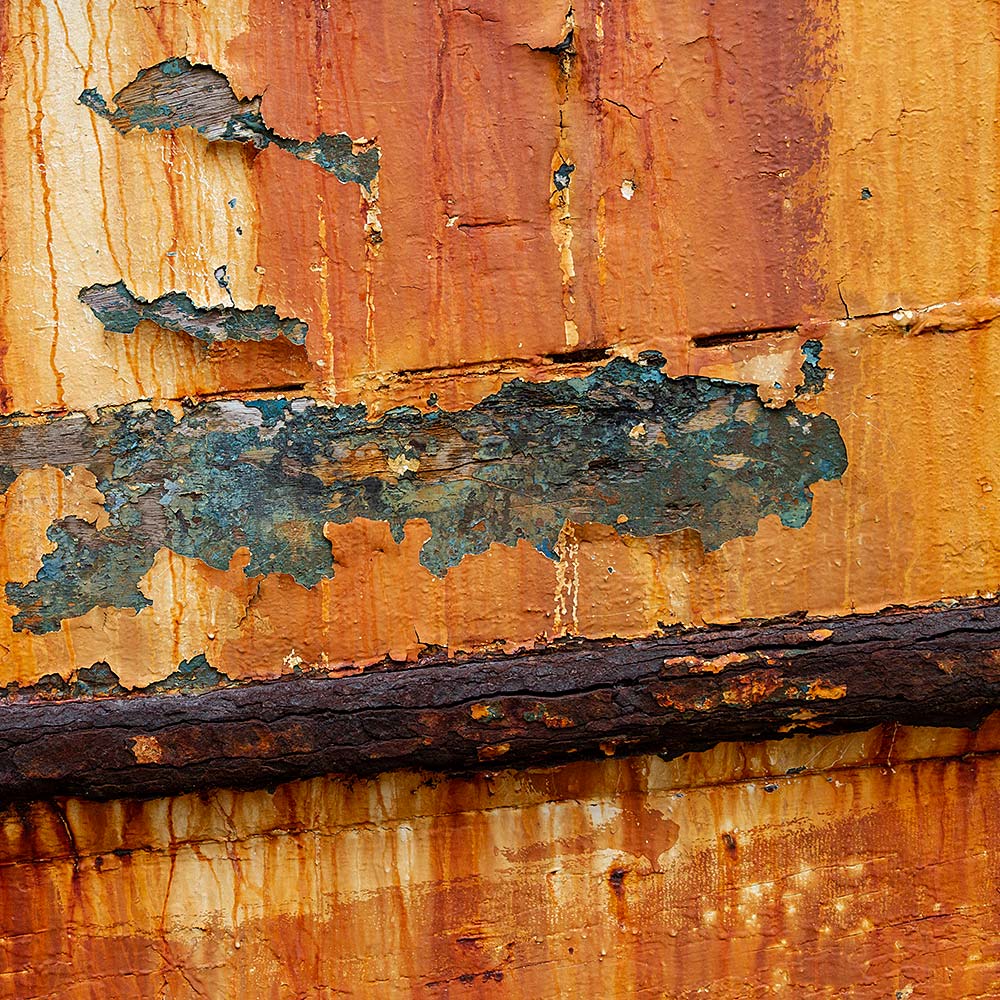 Camaret-sur_mer | The side of a rotting hulk of a fishing boat