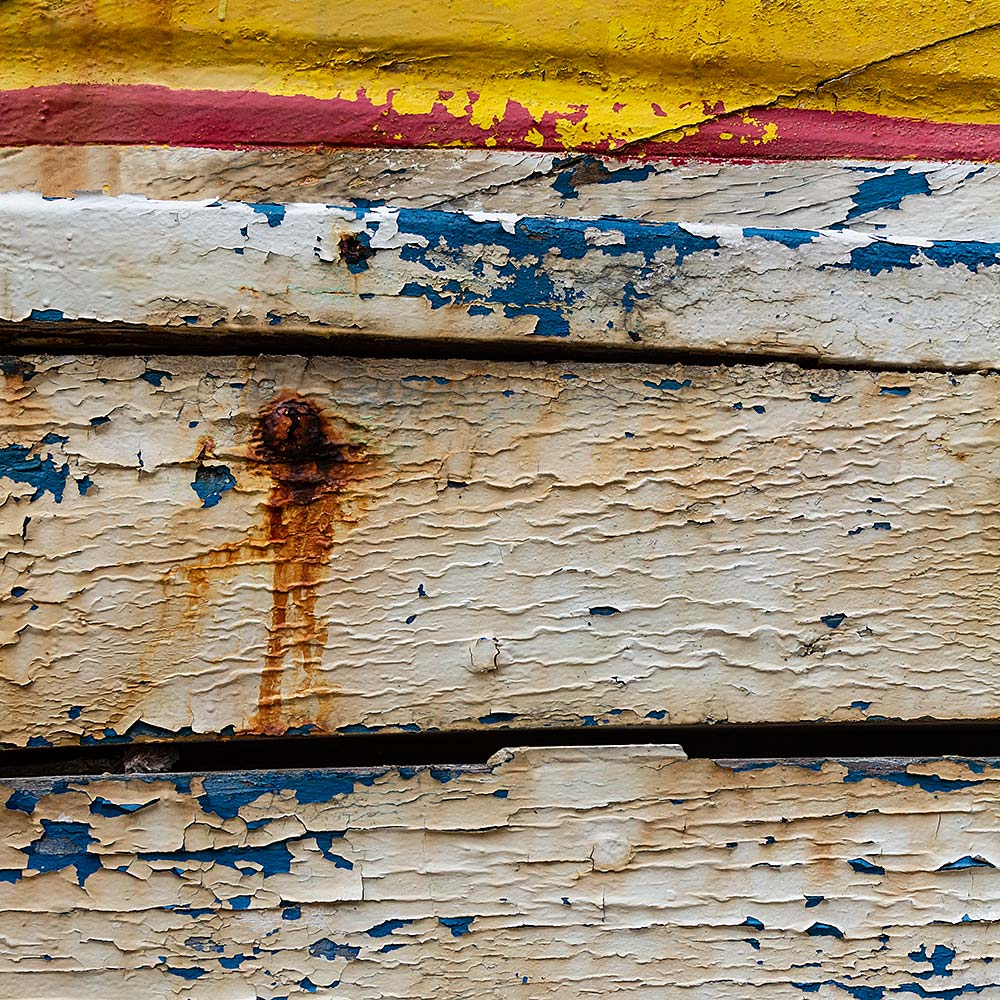 Camaret-sur_mer | The side of a rotting hulk of a fishing boat